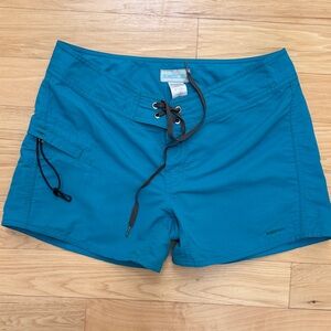 Teal Patagonia Watergirl
Board shorts with pocket and key clip sz 4